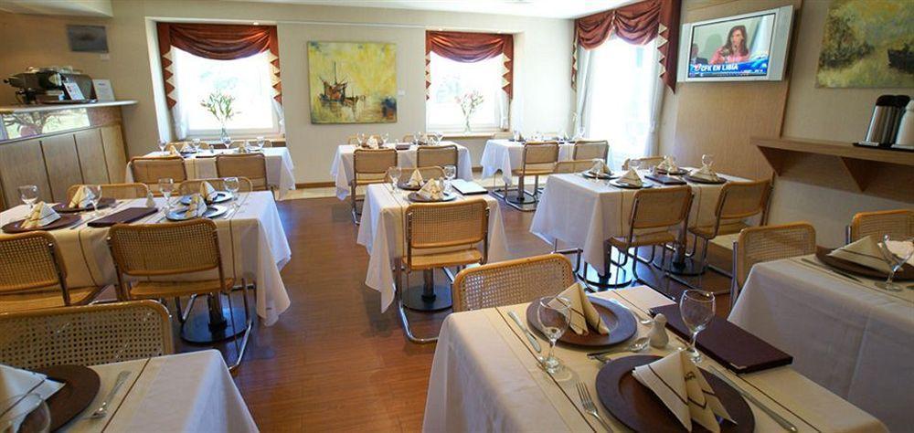 בואנוס איירס Hotel Aeroparque Inn & Suites מסעדה תמונה
